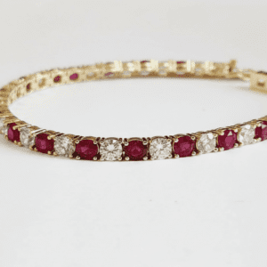Gold bracelet with alternating rubies and diamonds